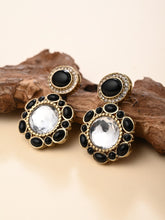 Statement earrings featuring a bold circular design with a vintage finish Black