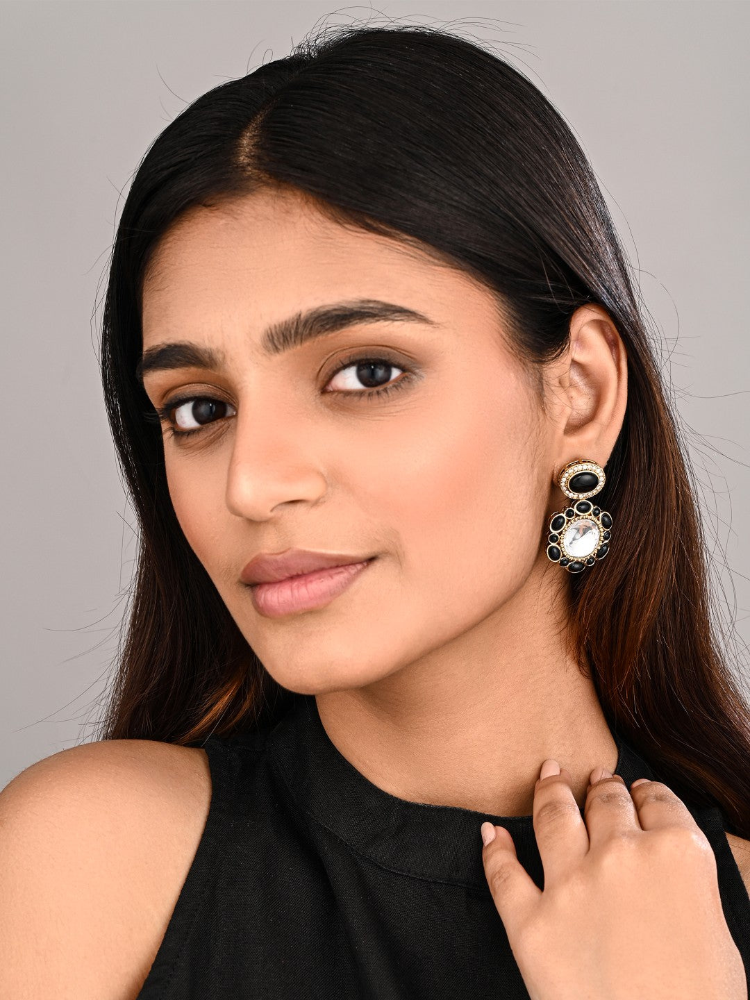 Statement earrings featuring a bold circular design with a vintage finish Black