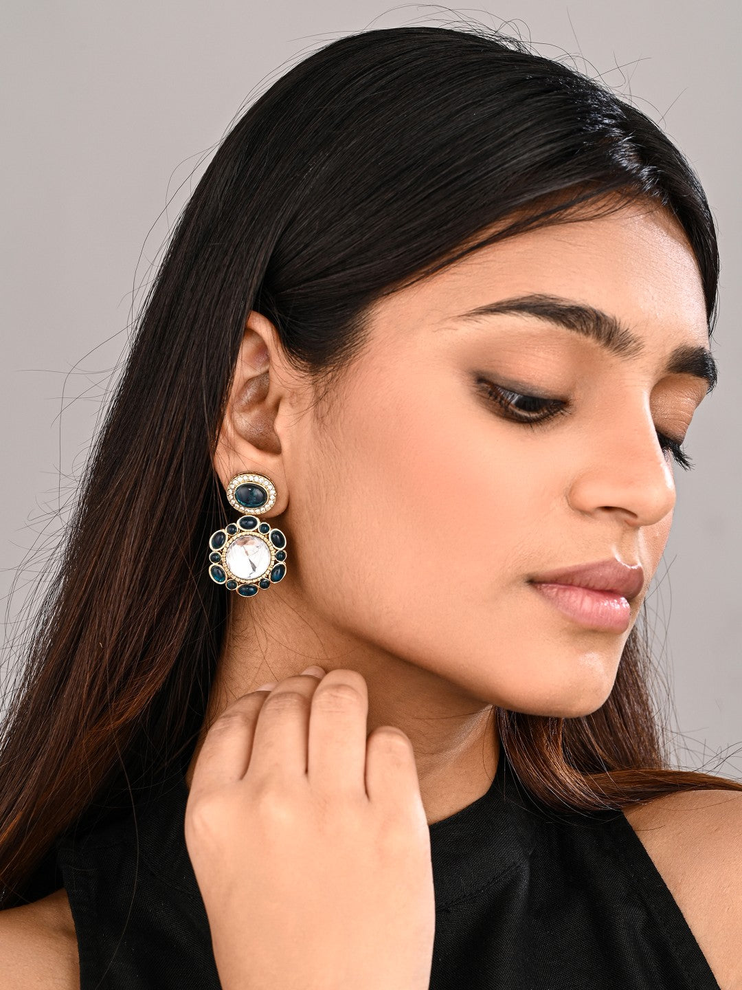 Statement earrings featuring a bold circular design with a vintage finish Blue