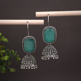 Silver Oxidised finish Jhumka with big glass Stone