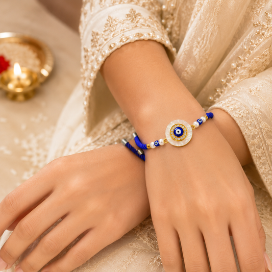 Mother of Pearl Evil Eye Lumba Rakhi with Blue Thread