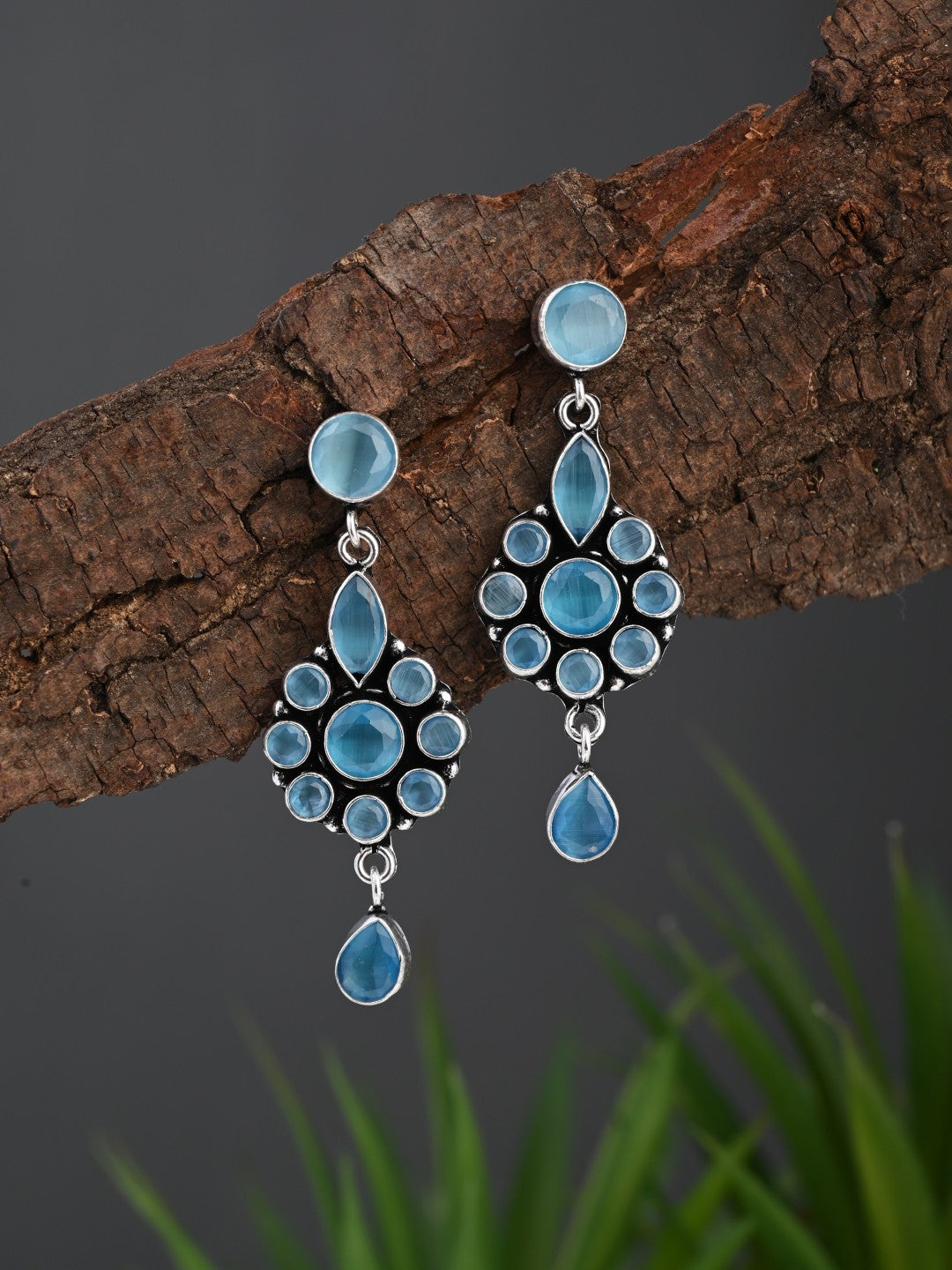 Brass Blue AD Stone Drop Earrings with Floral & Teardrop Design