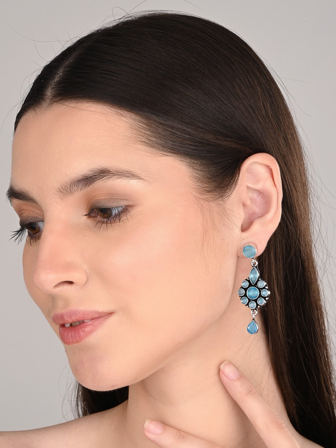 Brass Blue AD Stone Drop Earrings with Floral & Teardrop Design