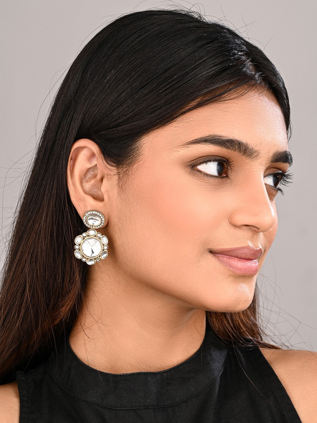 Statement earrings featuring a bold circular design with a vintage finish Gold