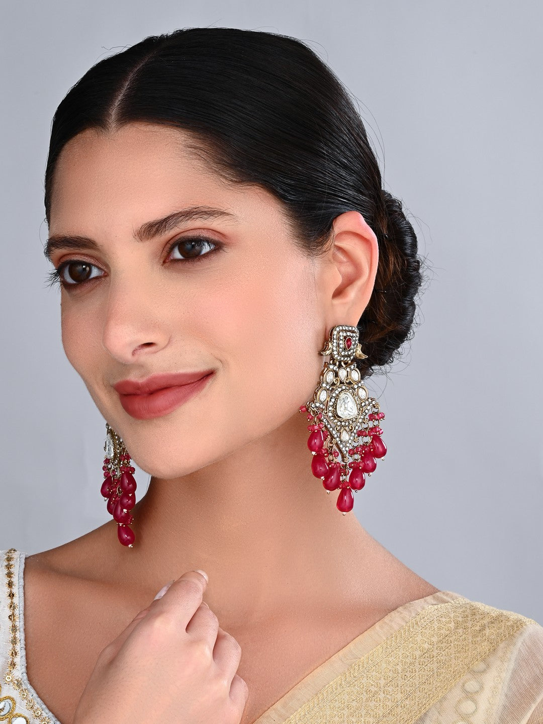 Gold-Toned Kundan Chandelier Earrings with Red Bead Drops