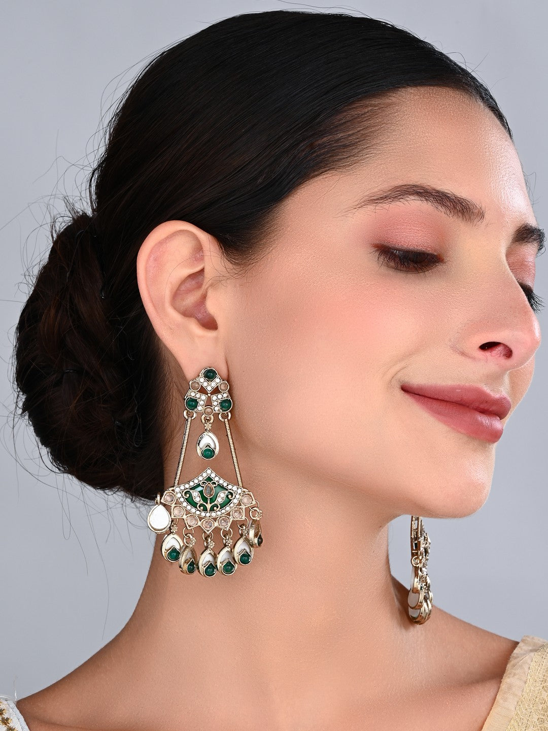Gold-Toned Kundan Chandbali Earrings with Green Stone Accents