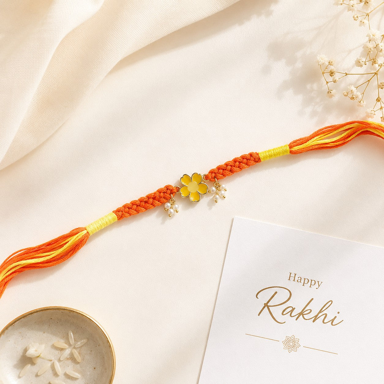 Yellow Floral & Elephant Charm Rakhi Set of 2