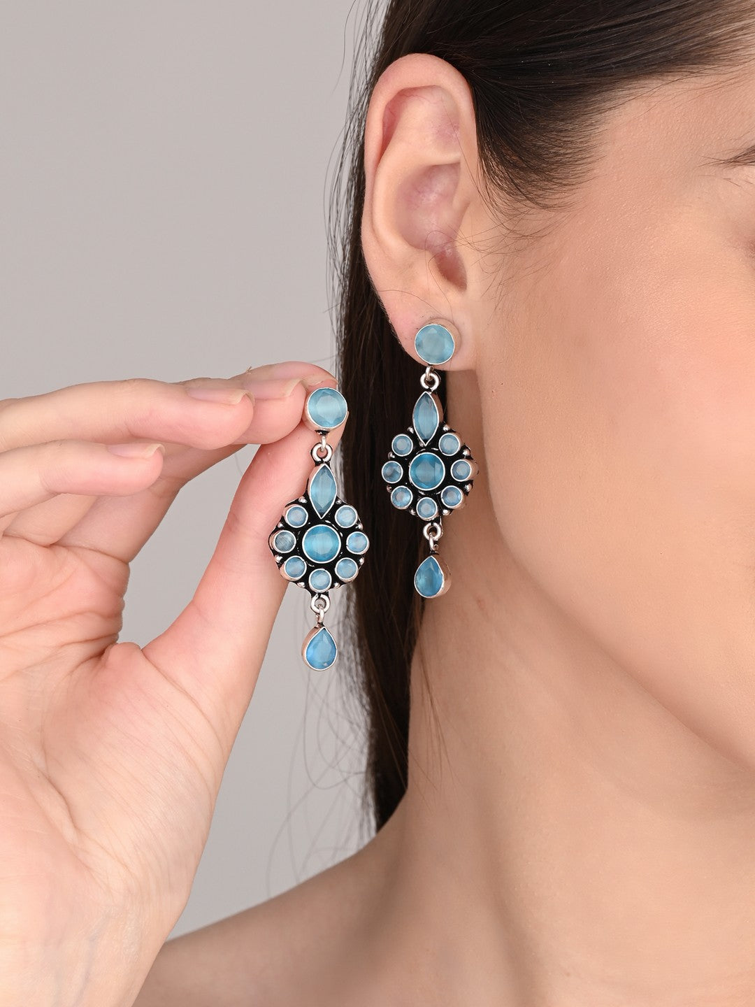 Brass Blue AD Stone Drop Earrings with Floral & Teardrop Design