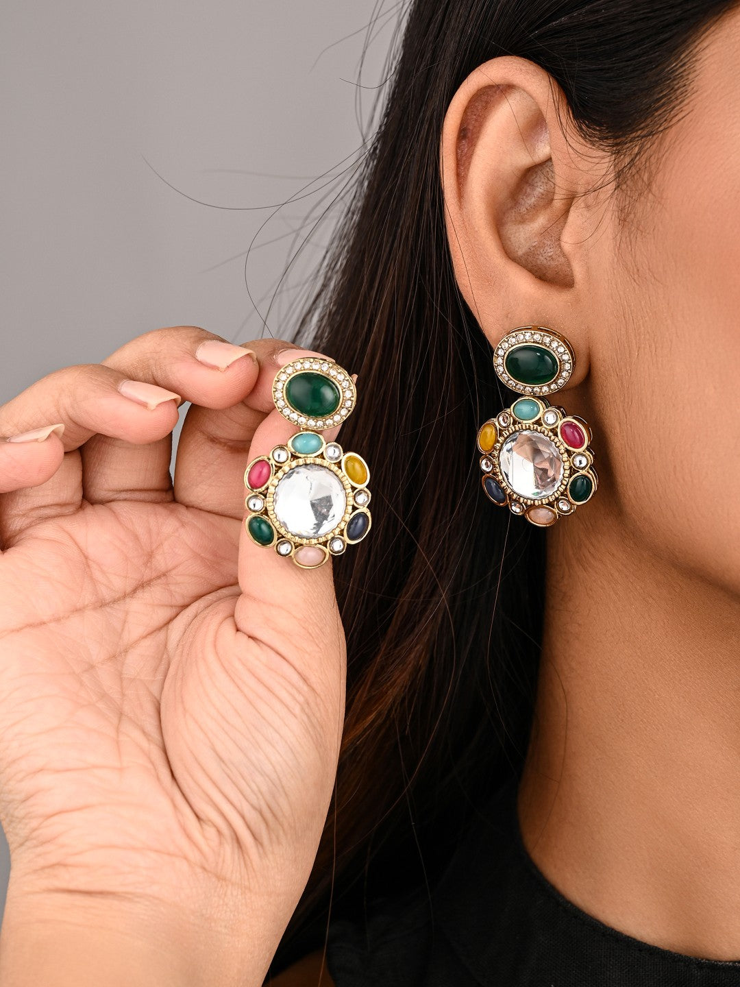 Statement earrings featuring a bold circular design with a vintage finish Multi