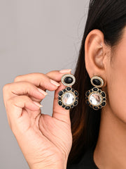 Statement earrings featuring a bold circular design with a vintage finish Black