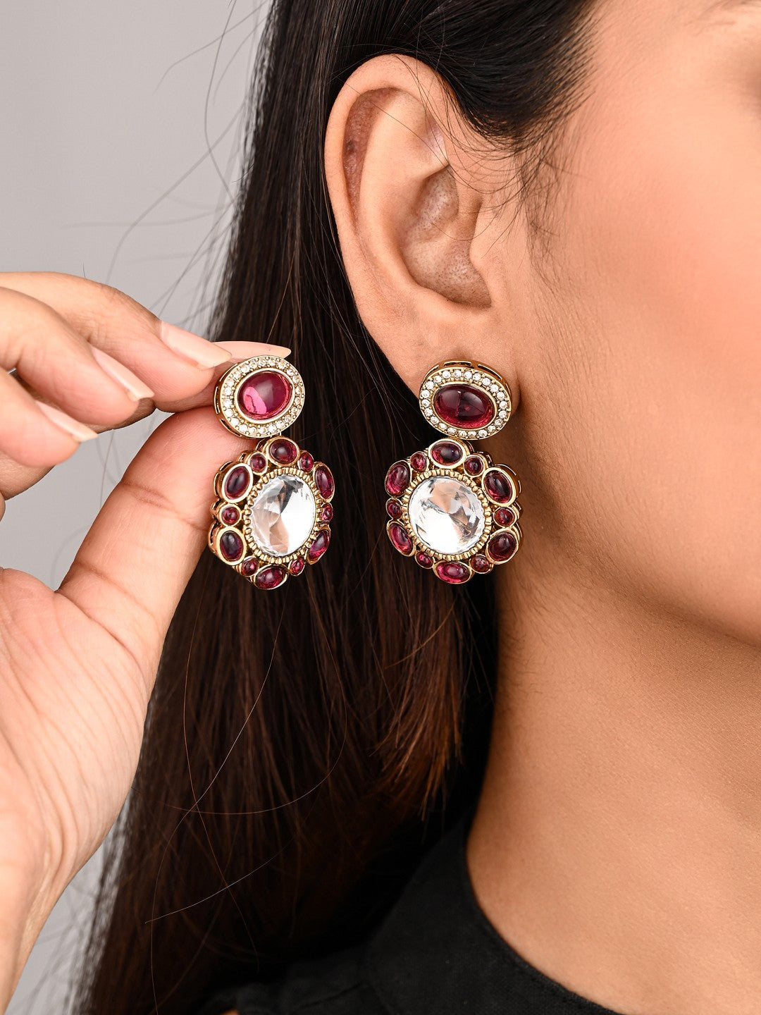 Statement earrings featuring a bold circular design with a vintage finish Wine