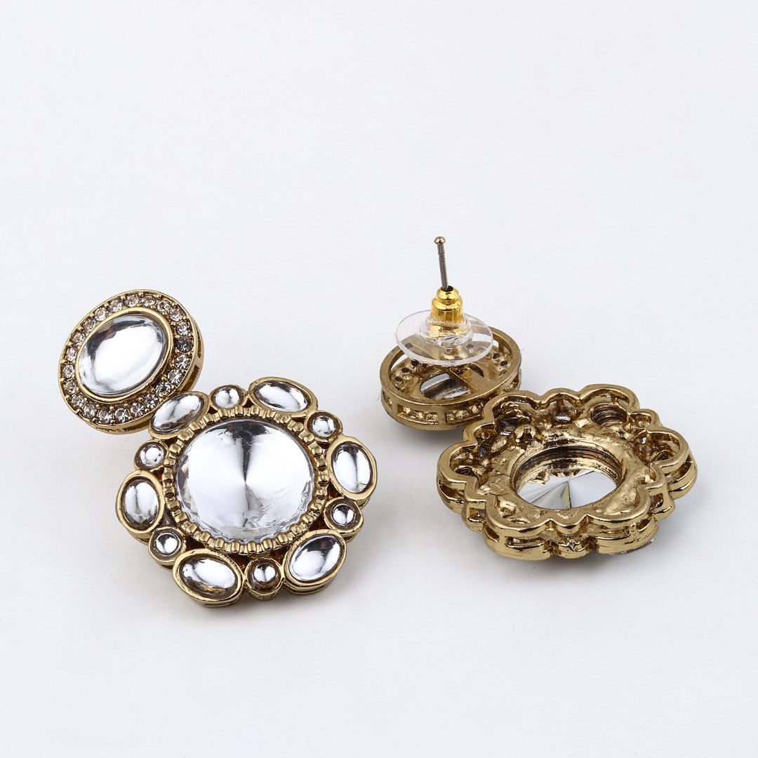 Statement earrings featuring a bold circular design with a vintage finish Gold