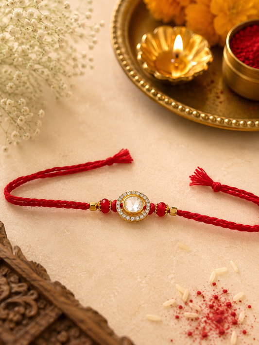 Radiant Crystal Halo Rakhi with Ruby Beads & Red Thread