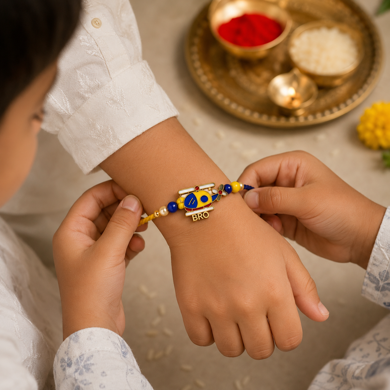 Kids Adventure Rakhi Set – Helicopter & School Bus Designer Rakhi for Raksha Bandhan