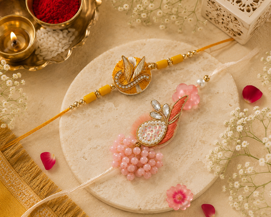 Designer Rakhi Duo – Blush Feather & Golden Leaf Handcrafted Rakhi Set