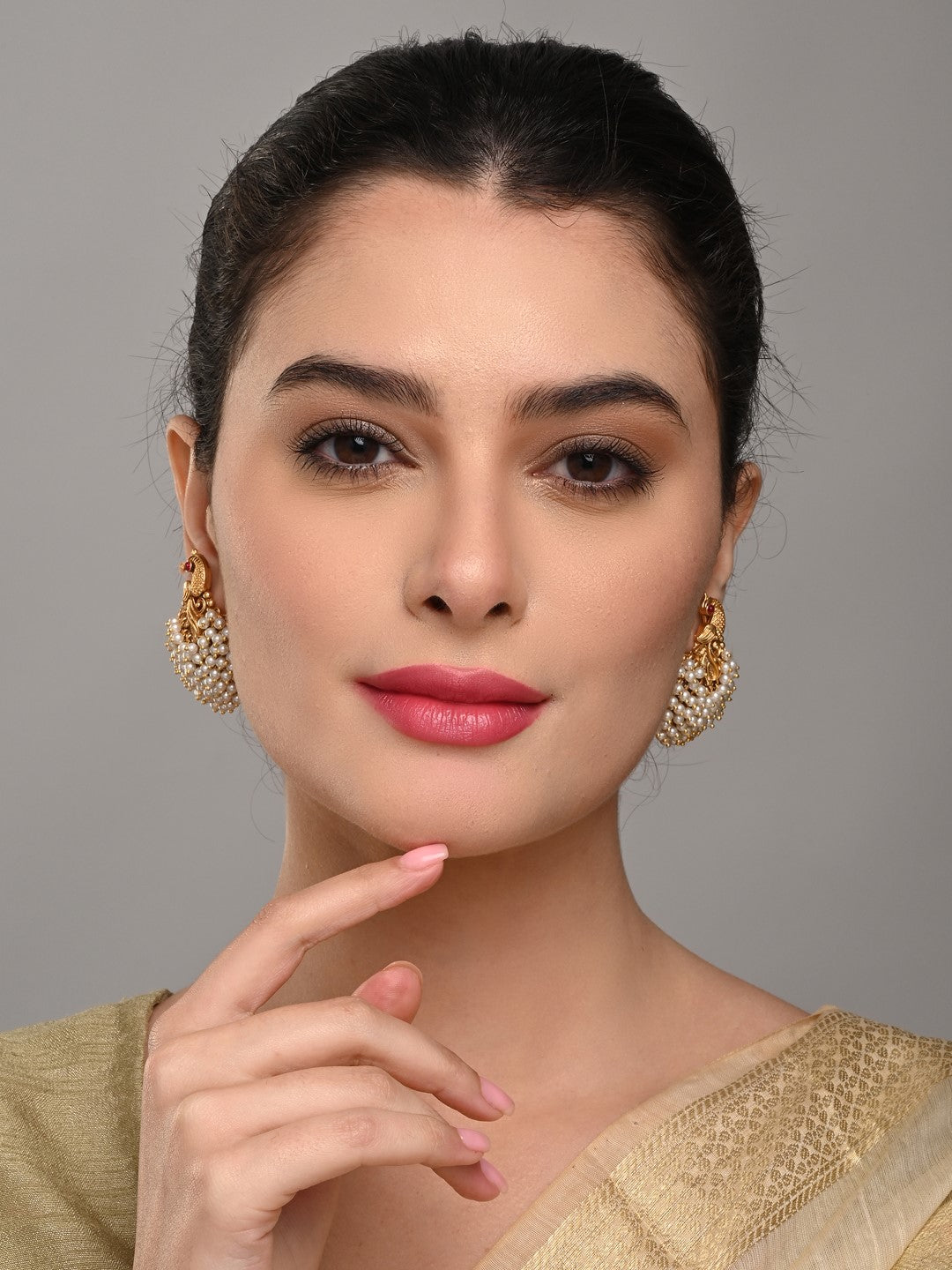 Temple-Style Gold-Plated Peacock Stud Earrings