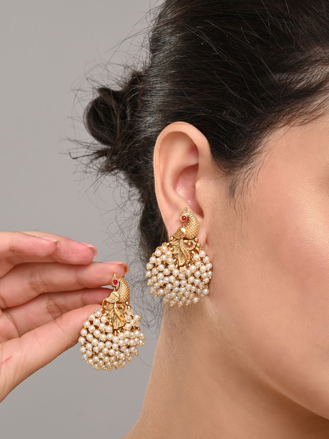 Temple-Style Gold-Plated Peacock Stud Earrings