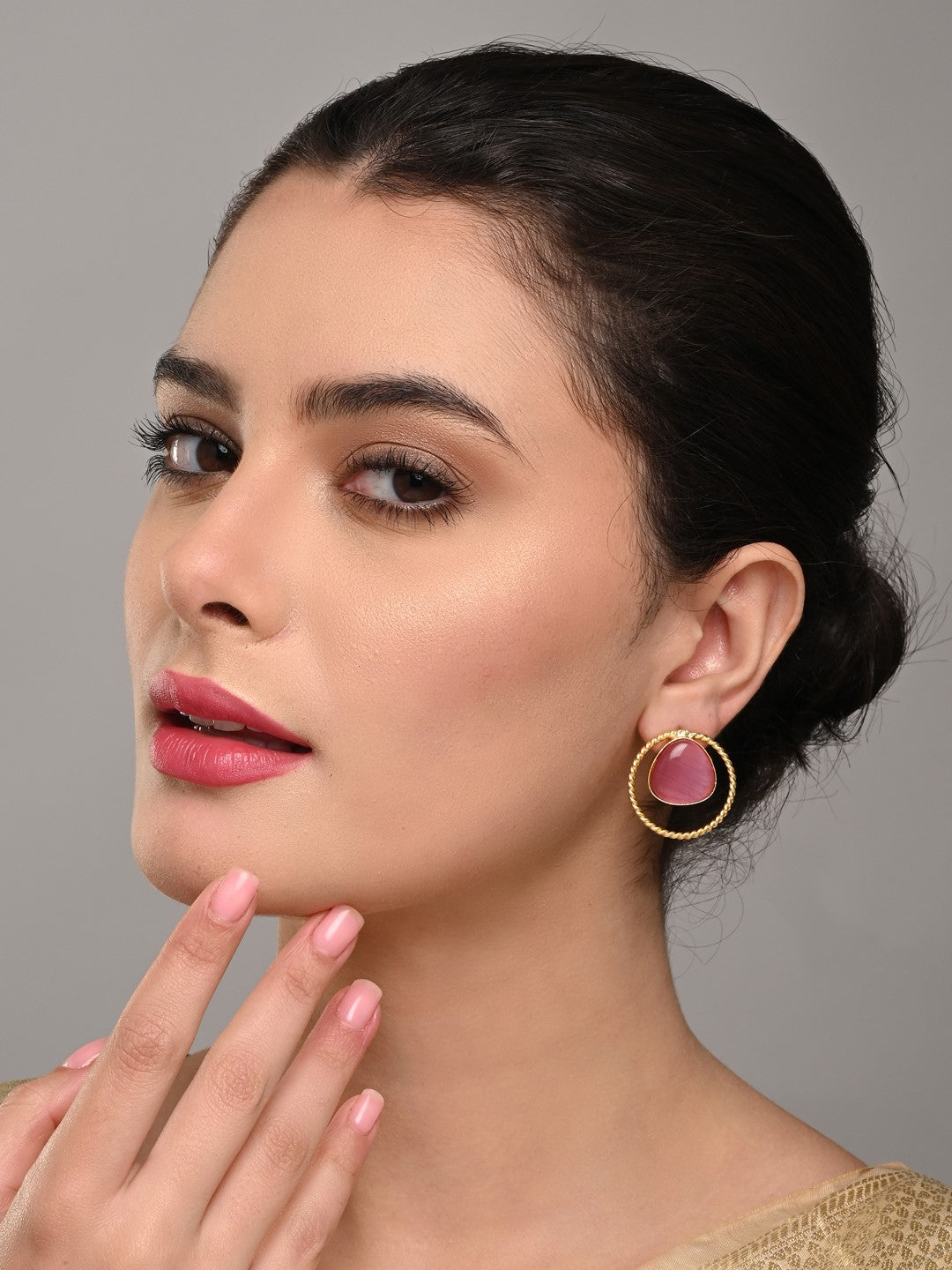 Gold plated geometric studs