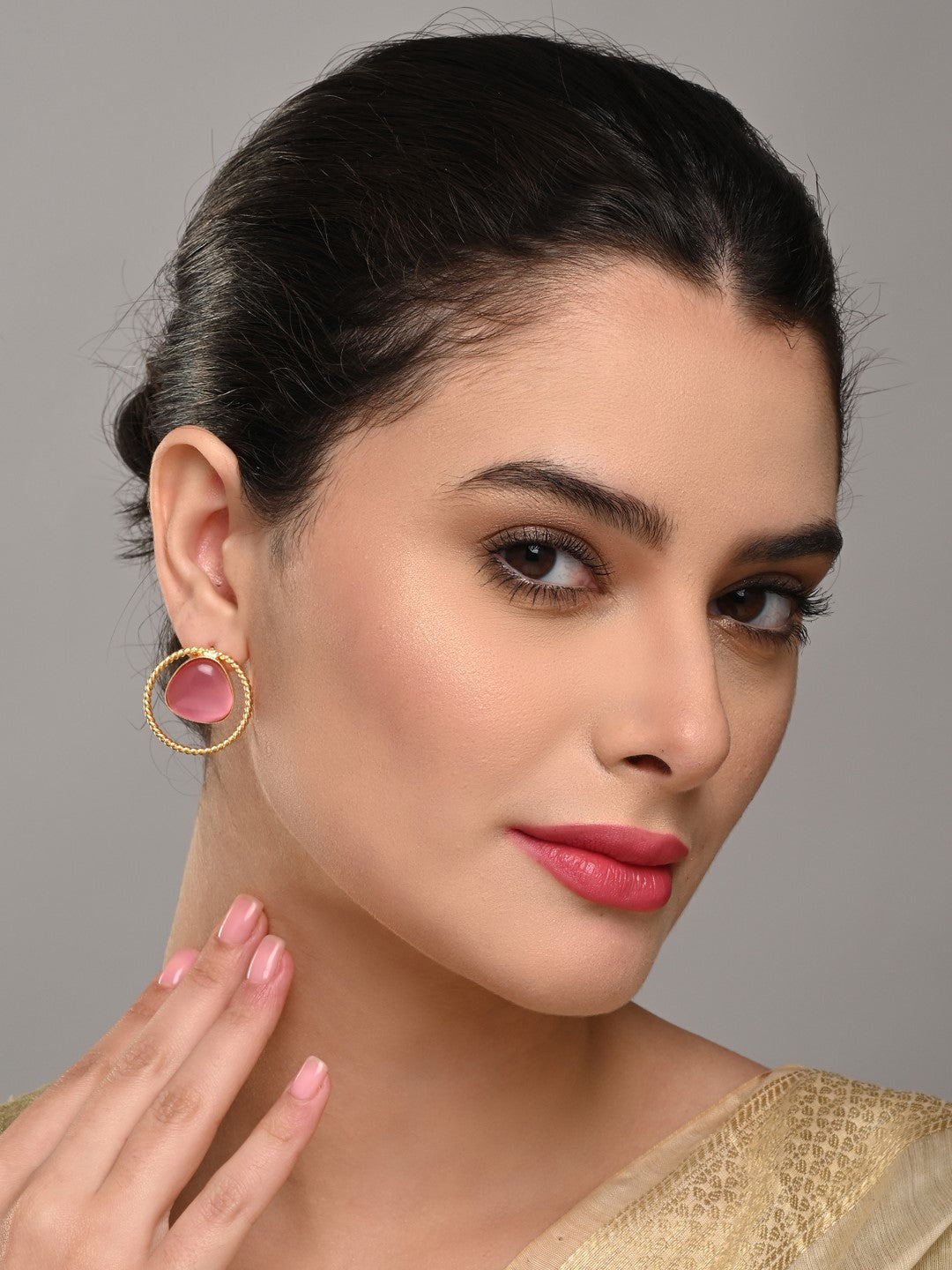 Gold plated geometric studs