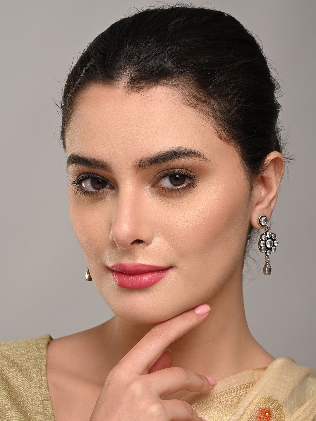 Brass White AD Stone Drop Earrings with Floral & Teardrop Design