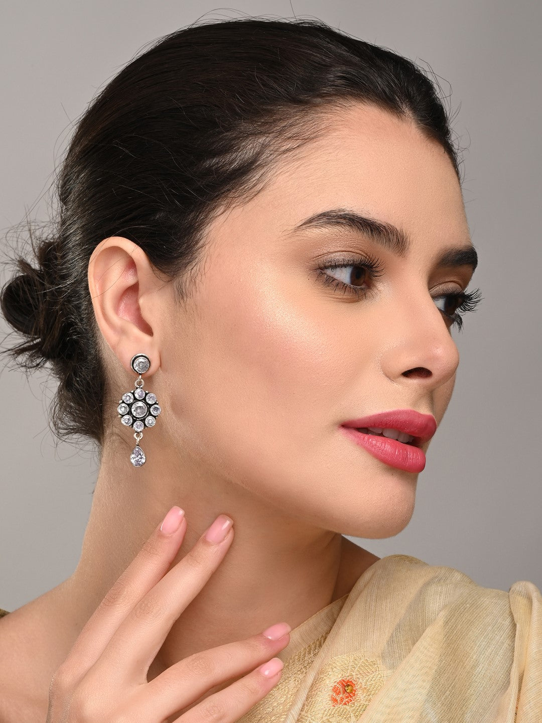 Brass White AD Stone Drop Earrings with Floral & Teardrop Design