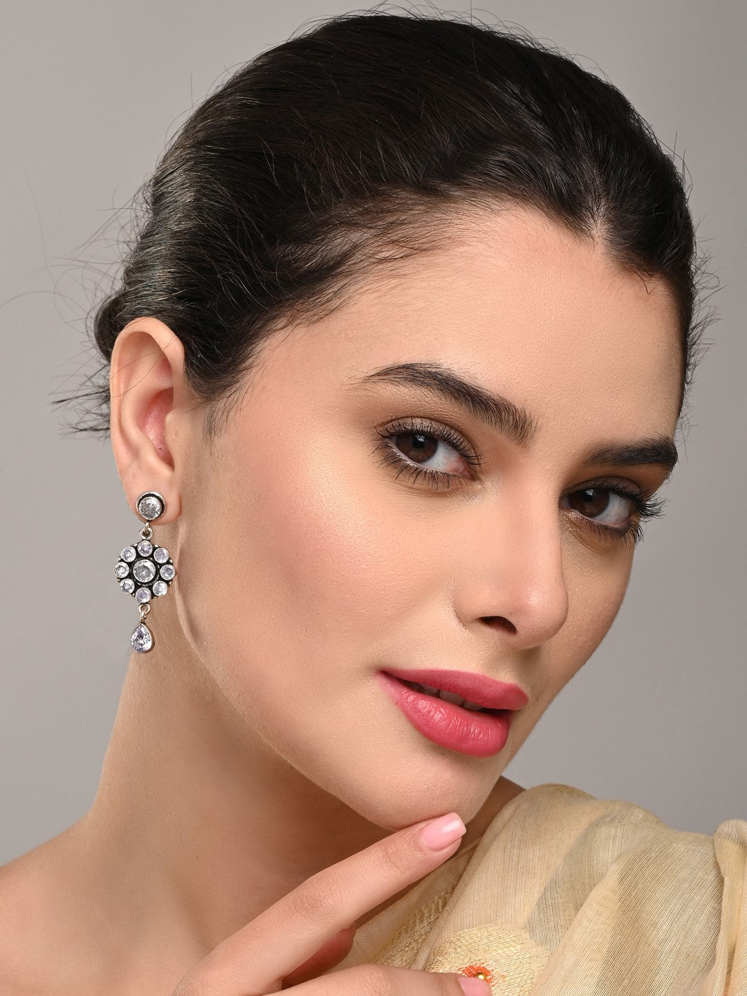 Brass White AD Stone Drop Earrings with Floral & Teardrop Design