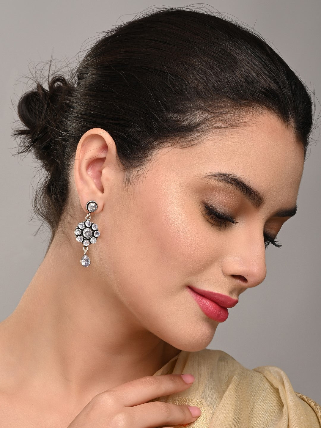 Brass White AD Stone Drop Earrings with Floral & Teardrop Design