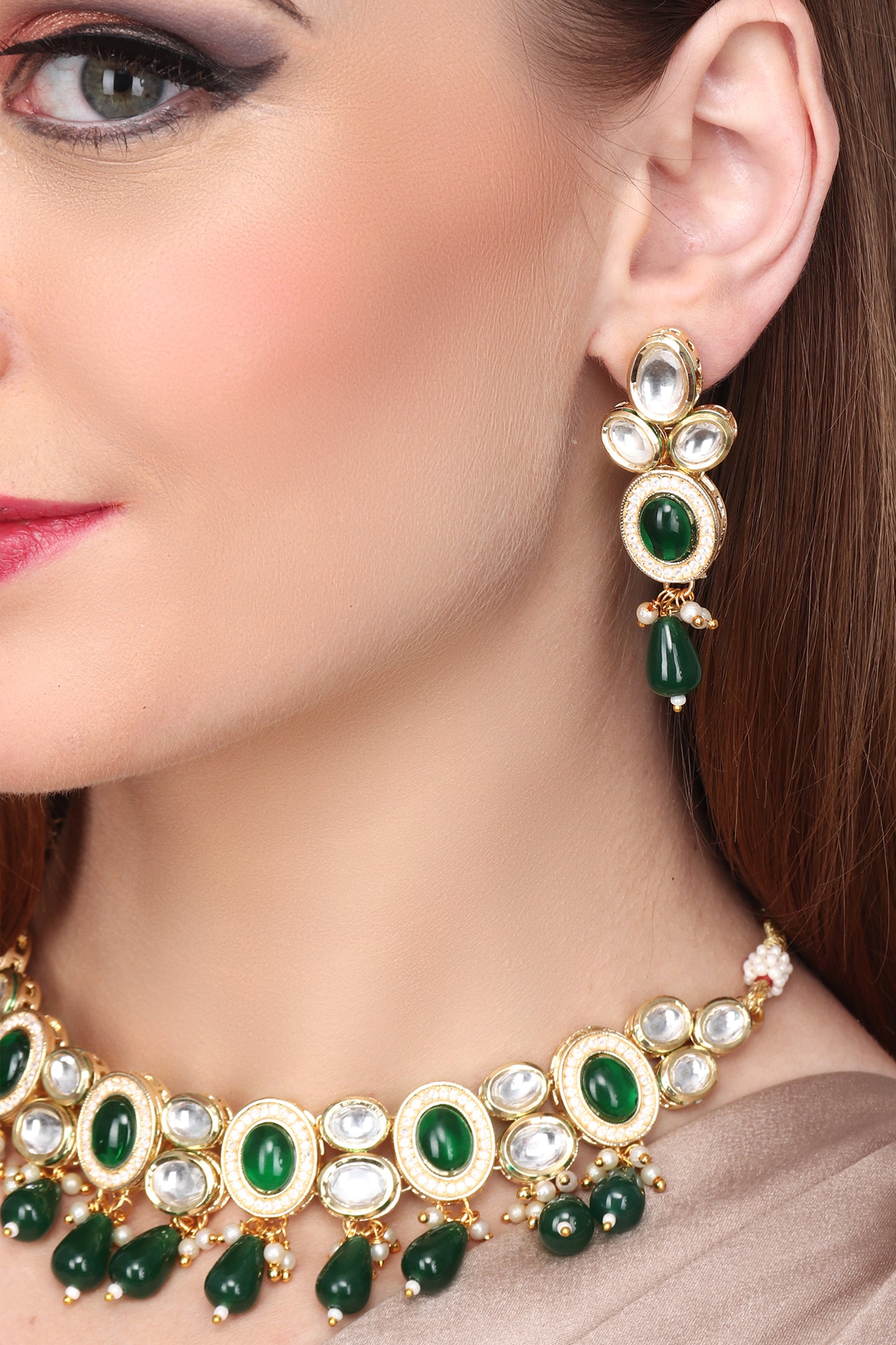 Gold plated Kundan choker set with green stone