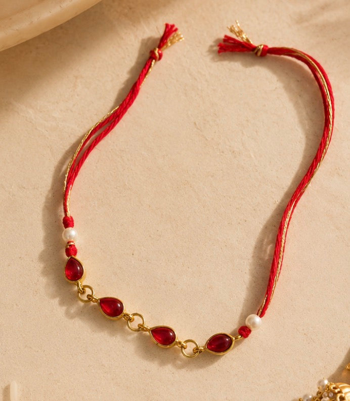 Ruby Red Bhaiya Bhabhi Rakhi Set – Elegant Kundan & Pearl Lumba Rakhi Combo