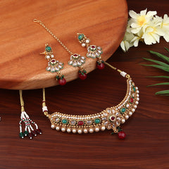 Multi coloured stone, temple design necklace earring & Maangtikka set